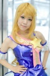 blonde_hair cosplay hoshii_miki idolmaster pleated_skirt shimotsuki_sato skirt tank_top rating:Safe score:0 user:nil!