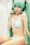 aqua_hair bikini chirumi_hiame cosplay hatsune_miku project_diva swimsuit twintails vocaloid rating:Safe score:2 user:lolzin