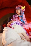 amatsuka_miyu bed cosplay night_cap nightgown patchouli_knowledge purple_hair robe thighhighs touhou rating:Safe score:0 user:nil!