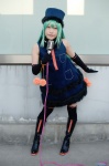 aqua_hair boots cosplay detached_sleeves dress hasui_yuuri hatsune_miku headset microphone project_diva thighhighs top_hat twintails vocaloid zettai_ryouiki rating:Safe score:2 user:nil!
