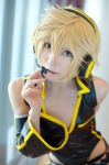 blonde_hair bodysuit choker cosplay crossplay detached_sleeves headset kagamine_len shorts tatsuki_(ii) vocaloid rating:Safe score:2 user:nil!