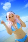animal_ears beach bikini bunny_ears cleavage cosplay headphones nitro_super_sonic ocean pink_hair saku side-tie_bikini super_soniko swimsuit underboob rating:Safe score:1 user:nil!