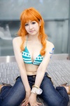 bikini_top cleavage cosplay lily_(iii) nami_(one_piece) one_piece orange_hair swimsuit trousers rating:Safe score:0 user:pixymisa