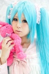 aqua_hair bow cosplay dress hatsune_miku lots_of_laugh_(vocaloid) plushie rushi twintails vocaloid rating:Safe score:1 user:pixymisa