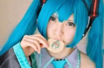 aqua_hair cosplay default_costume detached_sleeves hatsune_miku headset hina tie twintails vocaloid rating:Safe score:0 user:nil!