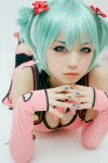 cosplay eki green_eyes green_hair hatsune_miku vocaloid rating:Safe score:7 user:pulsr