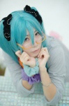 aoki aqua_hair cosplay glasses hatsune_miku headphones hoodie sound_(vocaloid) twintails vocaloid rating:Safe score:1 user:nil!