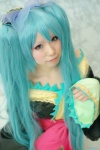 aqua_hair blue_eyes bow cosplay dress hatsune_miku mizusa twintails vocaloid rating:Safe score:0 user:pixymisa