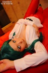 bed blouse cleavage cosplay green_hair morrigan_aensland open_clothes otomaru trousers vampire_(game) rating:Safe score:2 user:nil!