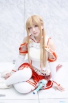 asuna_(sao) blonde_hair blouse boots breastplate cosplay detached_sleeves pleated_skirt skirt sword sword_art_online ten thighhighs zettai_ryouiki rating:Questionable score:0 user:nil!