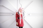 black_legwear cosplay darling_in_the_franxx dress emerald horns pantyhose pink_hair ratings:s usakichi zero_two rating:Questionable score:0 user:nil!