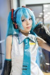 aqua_eyes aqua_hair blouse cosplay detached_sleeves hatsune_miku headset i-ai tie twintails vocaloid rating:Safe score:0 user:pixymisa