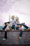 blonde_hair blouse blue_eyes cosplay crossplay detached_sleeves hairbow hair_clips headset kagamine_len kagamine_rin leggings mogeta scarf_tie shorts uri vocaloid rating:Safe score:0 user:pixymisa