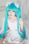 aqua_hair cosplay dress hatsune_miku tachibana_sakura twintails vocaloid rating:Safe score:0 user:pixymisa