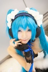 blue_hair bodice cosplay fingerless_gloves gloves hairband hatsune_miku headphones ribbon_tie skirt tatsuki_(ii) twintails vocaloid rating:Safe score:2 user:pixymisa