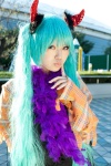 aqua_hair blouse boa cosplay devil_horns halloween hatsune_miku twintails umemaru vocaloid rating:Safe score:0 user:pixymisa