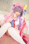 amatsuka_miyu bed blouse cosplay night_cap open_clothes patchouli_knowledge pleated_skirt purple_hair robe skirt thighhighs touhou zettai_ryouiki rating:Safe score:2 user:nil!