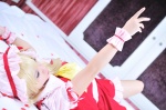 bed blonde_hair blouse cosplay flandre_scarlet hat irori miniskirt skirt touhou vest wings rating:Safe score:0 user:nil!