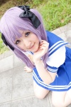 bow cosplay hairbows hiiragi_kagami hoshino_kana lucky_star pleated_skirt purple_hair sailor_uniform school_uniform skirt twintails rating:Safe score:0 user:pixymisa