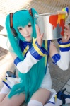 aka aqua_hair cosplay detached_sleeves dress hatsune_miku headset miracle_paint_(vocaloid) paintbrush single_thighhigh thighhighs twintails vocaloid rating:Safe score:0 user:nil!