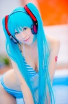 aqua_hair bikini cleavage cosplay hatsune_miku headset mashiro_yuki pool project_diva swimsuit twintails vocaloid wet rating:Safe score:2 user:nil!