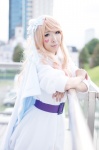 blonde_hair cape cosplay dress hairbow kurenai_aiki macross macross_frontier sheryl_nome rating:Safe score:0 user:pixymisa