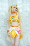 blonde_hair boots choker cosplay croptop cure_sunshine hairbows heartcatch_precure! hoshitamu miniskirt myoudouin_itsuki pretty_cure skirt tank_top twintails rating:Safe score:1 user:nil!