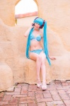 aqua_hair bikini cleavage cosplay hatsune_miku headset mashiro_yuki project_diva swimsuit twintails vocaloid rating:Safe score:0 user:nil!