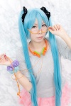 aoki aqua_hair cosplay glasses hatsune_miku headphones hoodie ipod looking_over_glasses miniskirt skirt sound_(vocaloid) twintails vocaloid rating:Safe score:0 user:pixymisa