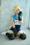 blonde_hair cosplay crossplay detached_sleeves half_skirt_open_front headset kagamine_len one-piece_swimsuit pantyhose swimsuit tamaki thighhighs vocaloid rating:Safe score:0 user:nil!