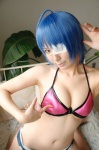 ahoge bed bikini_top blue_hair cleavage cosplay denim eyepatch ikkitousen kibashi open_clothes ryomou_shimei shorts swimsuit rating:Safe score:3 user:nil!