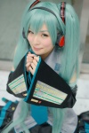 aqua_hair blouse cosplay detached_sleeves hatsune_miku headset maitako pleated_skirt skirt tie twintails vocaloid rating:Safe score:0 user:pixymisa