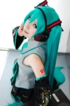 aqua_hair cosplay default_costume detached_sleeves hatsune_miku headset mizuno_shiro pleated_skirt skirt thighhighs tie twintails vocaloid rating:Safe score:1 user:nil!