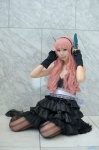 cleavage cosplay dress fingerless_gloves gloves hairband headset megurine_luka pantyhose pink_hair sakuramiya_rei vocaloid rating:Safe score:0 user:nil!