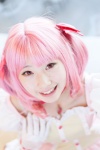 choker cosplay dress gloves hairbow kaname_madoka kujyou_konegi pink_hair puella_magi_madoka_magica red_eyes twintails rating:Safe score:0 user:pixymisa