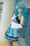 aqua_hair colorful_x_melody_(vocaloid) cosplay detached_sleeves dress hairband hatsune_miku kei project_diva thighhighs twintails vocaloid zettai_ryouiki rating:Safe score:0 user:nil!