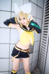 blonde_hair cosplay default_costume headset kagamine_rin mizuno_shiro vocaloid rating:Safe score:0 user:Log