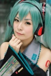 aqua_hair blouse cosplay detached_sleeves hatsune_miku headset maitako tie twintails vocaloid rating:Safe score:0 user:nil!