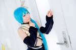 aqua_hair cosplay croptop detached_sleeves hairbow hatsune_miku mashiro_yuki pleated_skirt ponytail project_diva skirt vocaloid rating:Safe score:0 user:nil!