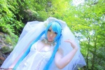 aqua_hair cleavage cosplay dress hatsune_miku saku scene_ever_4 twintails veil vocaloid rating:Safe score:1 user:nil!