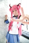 angel_beats! cosplay hair_ribbons handcuffs mikado pink_hair pleated_skirt sailor_uniform school_uniform skirt twintails yui_(angel_beats!) rating:Safe score:0 user:nil!