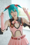 aqua_hair cosplay dress hairbows hatsune_miku project_diva ryui twintails vocaloid wings world_is_mine_(vocaloid) rating:Safe score:0 user:nil!