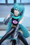 aida_yukiko aqua_hair boots cosplay croptop elbow_gloves gloves hatsune_miku headset pantyhose project_diva shorts sleeveless thigh_boots thighhighs twintails vocaloid rating:Safe score:0 user:pixymisa