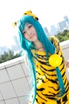 animal_ears aqua_hair azami cham_cham cosplay queen's_gate tiger_print rating:Safe score:0 user:pixymisa