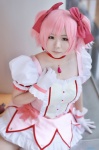 choker cosplay dress gloves hairbows kaname_madoka nozaka_yuu pink_hair puella_magi_madoka_magica twintails rating:Safe score:0 user:nil!
