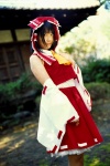 blouse cosplay detached_sleeves hairbow hakurei_reimu matsunaga_ayaka miko skirt touhou rating:Safe score:0 user:nil!