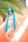 aqua_hair bikini cleavage cosplay hatsune_miku headset mashiro_yuki project_diva swimsuit twintails vocaloid rating:Safe score:0 user:nil!