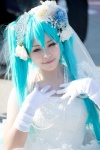 aqua_hair blue_eyes cosplay elbow_gloves gloves hatsune_miku headdress ichijou_rio necklace twintails veil vocaloid wedding_dress rating:Safe score:0 user:pixymisa
