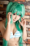 aqua_hair bikini cleavage cosplay hatsune_miku project_diva saku swimsuit twintails vocaloid rating:Safe score:2 user:nil!