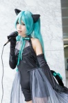 animal_ears aqua_eyes aqua_hair blouse cat_ears cosplay elbow_gloves gloves half-skirt hatsune_miku microphone ribbon_tie rubia shorts tail twintails vocaloid rating:Safe score:0 user:pixymisa